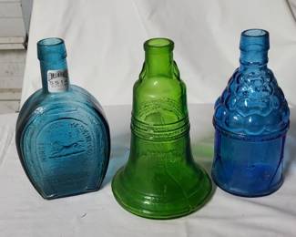 vintage colored bottles approx 6" tall