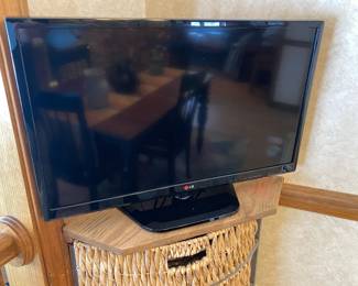 LG TV is 28"