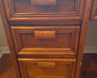 Rattan accents on the wood desk