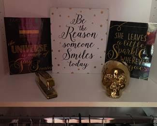 Gold skull and stapler...