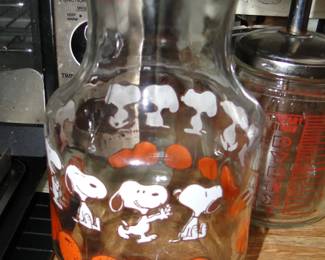 Snoopy orange juice container
