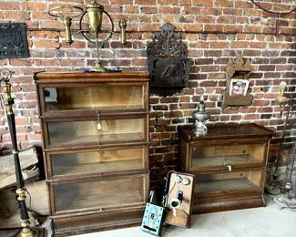 Bookshelves with glass lift up front,4 shelf tall unit and 2 shelf short .
Lots of treasures in the lower building. We are uncovering more everyday