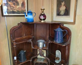 Corner Hutch
This is a corner hutch, a piece of furniture designed to fit snugly into a corner of a room.
44" wide, 30" deep, 53" tall
It can be used to display china, glassware, collectibles, or store items like serving bowls or kitchen supplies.