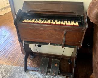 vintage pump organ, also known as a reed organ or harmonium