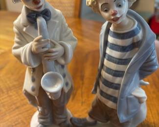 Lladro "Sad Sax" Porcelain Figurine No. 5471, Lladro “Little Traveler” Porcelain Figure No. 7602