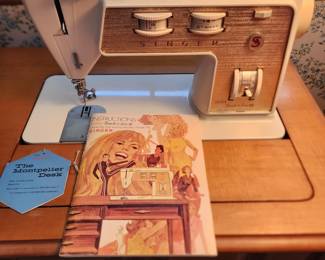 Singer sewing machine comes in a nice cabinet with a chair