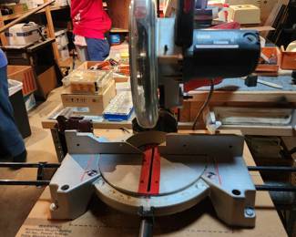 Craftsman 10" compound saw on a rolling stand