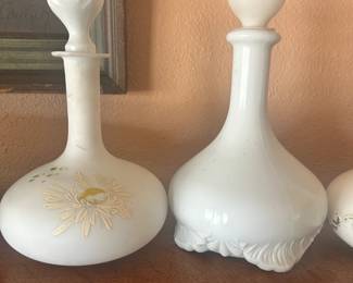 Lots of vintage glass decanters and stoppers