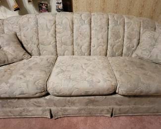 Vintage couch on wheels