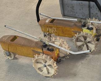 2 Vintage Tractor Sprinklers