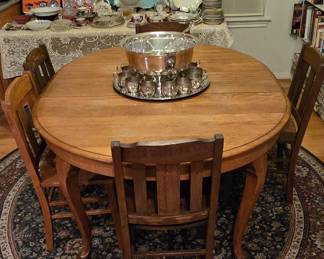 Nice Oak Kitchen Table with One Leaf and 6 Chairs - Round Rug - Silverplate Punch Bowl with Cups and Charger