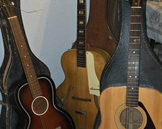 First guitar over 100 years old. 2nd one is a Monterey. 3rd one is a Yamaha