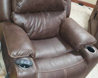There are a pair of recliner 'movie' chairs available  ~  they are  OFF-SITE  but can be easily seen after the regular sale hours  