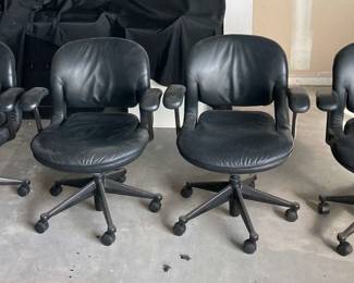 PA104Four Black Rolling Office Chairs