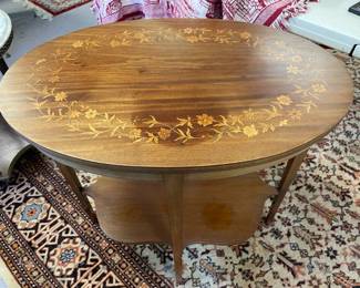 Oval wood inlaid table