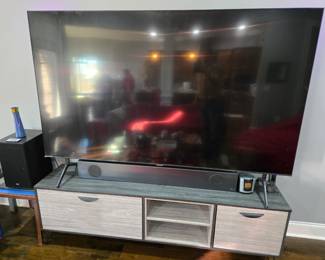 83 inch Samsung with surround sound.