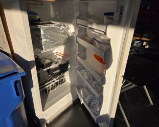 Stand up freezer.