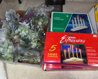 Christmas lighted candles with boxes