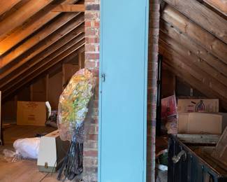 Tall metal locker style cabinet