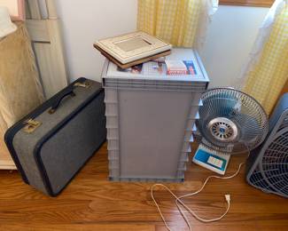 Luggage , fan and file holder