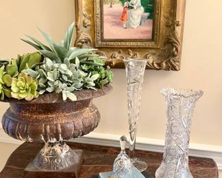 Antique cast iron urn with a lovely succulent arrangement