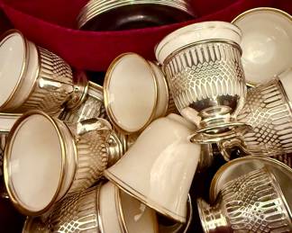 Sterling porcelain Demi-tasse with sterling saucers 