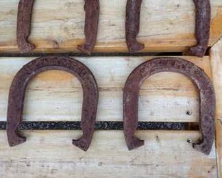 000.Main Image Set of four vintage horseshoes marked CHAMP