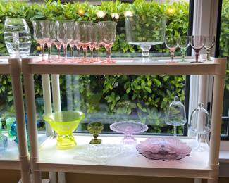 Colorful glass including pink wine glasses