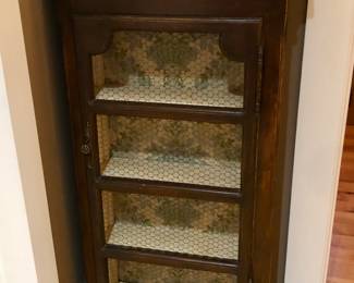 “French Country” cabinet with chicken wire on door (20”W, 8”D, 51”H - door hinges on right)