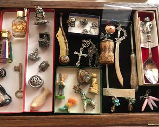 Case items: pewter & small animal figurines, boatswain whistle, sterling handle button hook, Reed & Barton Xmas spoon