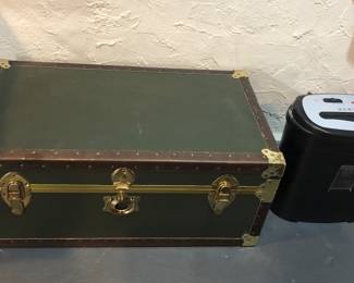 Green trunk, paper shredder