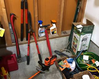 Hedge trimmer, axe, loppers, hoses