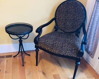Chair with leopard upholstery, metal table with black marble top (16” diam., 25” high)