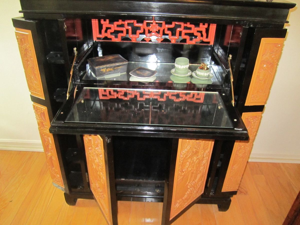 Hand carved Asian desk with side doors also can be used as a portable bar