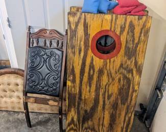 Cornhole boards and bags $40, antique chair with decorative stitching $15
