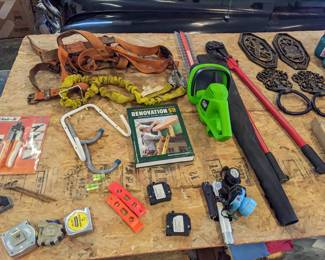 heavy duty harness with hooks safety rope ($20), tape measures ($2 each), home renovation book ($10), new electric hedge trimmers ($20), black roll of landscaping fabric ($5), heavy duty 36" bolt cutters ($30), more