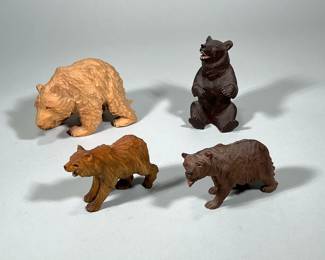 (4pc) CARVED WOOD BEAR FIGURES | Lot of 4 carved wood brown bears including bear marked “Hawaii” - h. 4.5 x w. 4 x l. 7 in (largest)
