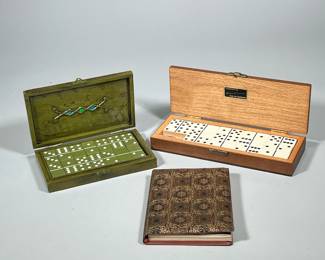 (3pc) DOMINO SETS & BOOK | Including: hand carved wood domino box engraved “Silverado Invitational 1973”, green painted domino box with green dominoes, and tooled leather dominoes score book - h. 1.5 x w. 4 x l. 11.5 in
