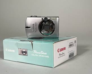 Canon PowerShot ELPH 300 HS | Camera in original box with spare battery and battery charging kit - w. 3.75 x l. 4.75 x d. 1 in
