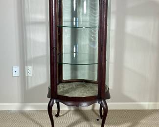 GLASS DISPLAY CASE | Carved wood & glass display with rounded glass sides with 2 glass shelves over cabriole legs. - h. 53 x w. 28 x l. 28 in
