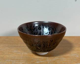 SMALL FLAMBE BOWL | Small bowl or tea cup with flambe glaze with iridescence, no apparent marking or signature - h. 2-1/4 x dia. 3-3/4 in.
