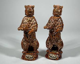 (2pc) PAIR EZRA BROOKS BEAR WHISKEY BOTTLES | Pair of bear-form ceramic Ezra Brooks Whiskey Bottles - h. 14 x w. 4.5 x l. 5 in
