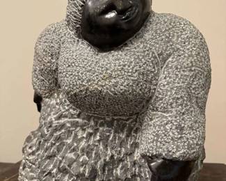 Colleen Madamombe's (1964–2009) Shona Stone Art
A very heavy Shona stone statue, measuring 13"H x 15"W.



The value of Colleen Madamombe's sculptures can vary widely depending on several factors, including the size, intricacy, condition, provenance, and whether the piece was exhibited in significant galleries or collections. Generally, her works are highly sought after due to their artistic quality and cultural significance. Here are some general pricing guidelines:



Small to Medium-Sized Sculptures: Smaller pieces or less intricate works might sell for a few thousand dollars, typically ranging from $2,000 to $10,000, depending on the details and demand.



Colleen Madamombe (1964–2009) was a celebrated Zimbabwean sculptor known for her expressive and symbolic stone carvings, which often depicted women and their roles in society. She was a prominent figure in the Shona art movement, which is centered around the traditional stone sculpting techniques of Zimbabwe.