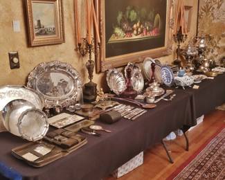 Large Assortment of Silverplate Serving Pieces; those closest to the left form the Collection of Kathleen Hughes