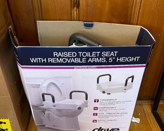 Raised toilet seat