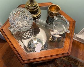 3 tables..two rectagular and one octagon. Rattan on the bottom shelf. Very well made.