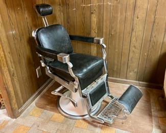Antique 1920’s Koken barber chair. Upholstery and chrome are excellent, and no cracks in the porcelain base.