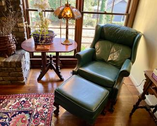 Green leather recliner and ottoman  by Bradington Young