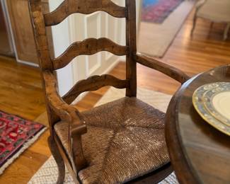 Close up of ladder back rush seat chairs