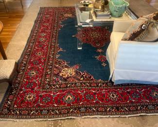 8.5’ x 12.5’ oriental rug, 12’ x 21’ antelope rug (has custom cut out for fireplace on 21’ side)